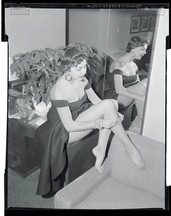 Framed Print : Jeannie Johnson Putting On Nylon Stockings Framed Print : Jeannie Johnson Putting On Nylon Stockings