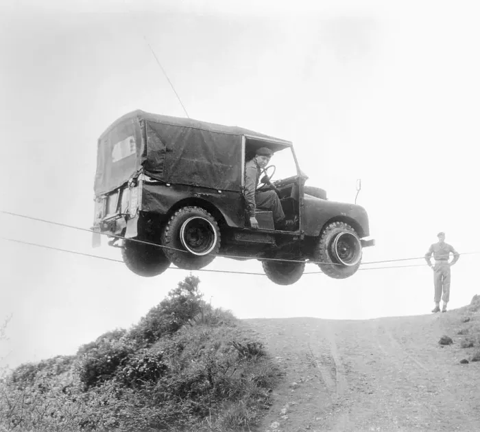 Framed Print : Jeep Traveling on Wires Framed Print : Jeep Traveling on Wires