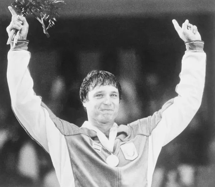 Framed Print : Jeff Blatnick Holding His arms up in Victory After Wrestling Event Framed Print : Jeff Blatnick Holding His arms up in Victory After Wrestling Event