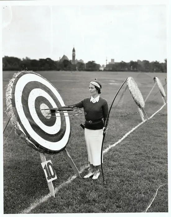 Framed Print : Jennette Baise Standing by Archery Target Framed Print : Jennette Baise Standing by Archery Target