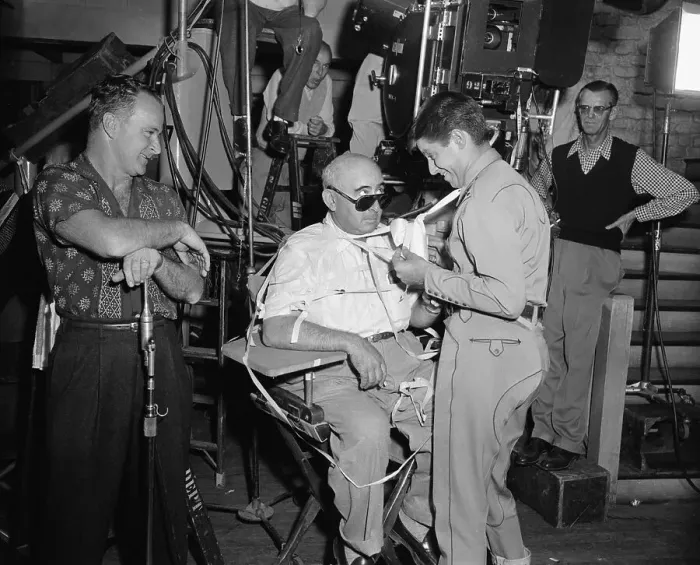 Framed Print : Jerry Lewis Taping Norman Taurog to His Chair