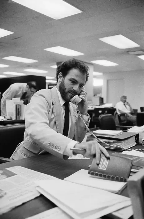 Framed Print : Jerry Rubin on Phone in Wall St. Office