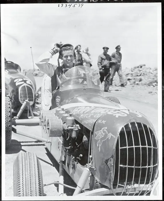 Framed Print : Jerry Unser Waving from His Race Car