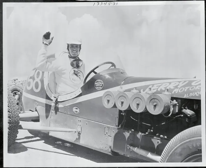 Framed Print : Jerry Unser Waving from His Race Car