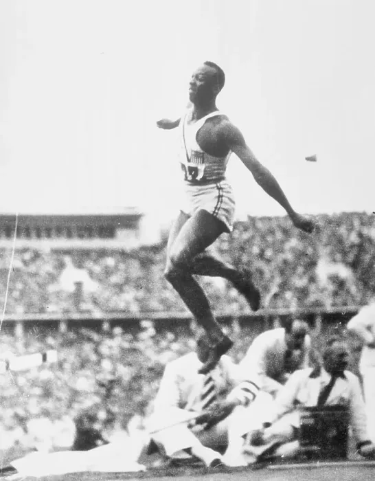 Framed Print : Jesse Owens in the Air During Olympic Games Framed Print : Jesse Owens in the Air During Olympic Games