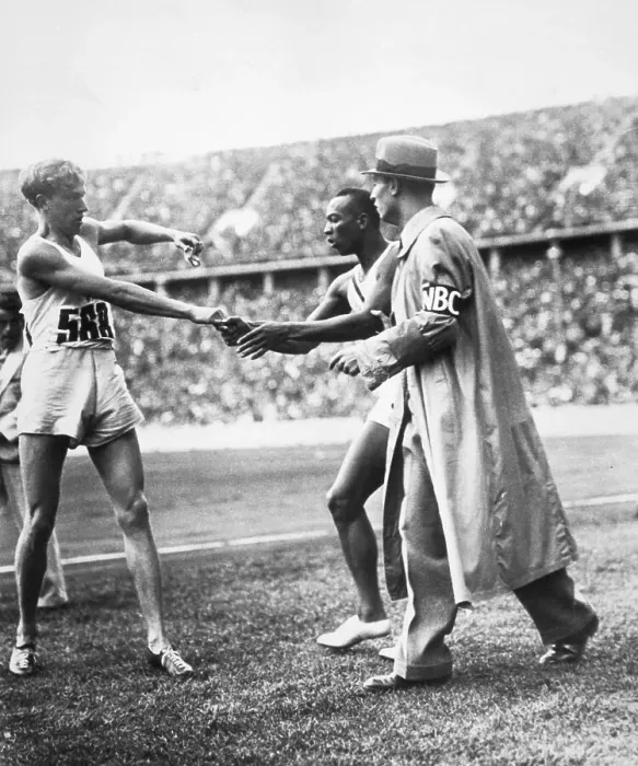 Framed Print : Jesse Owens Is Congratulated After Race