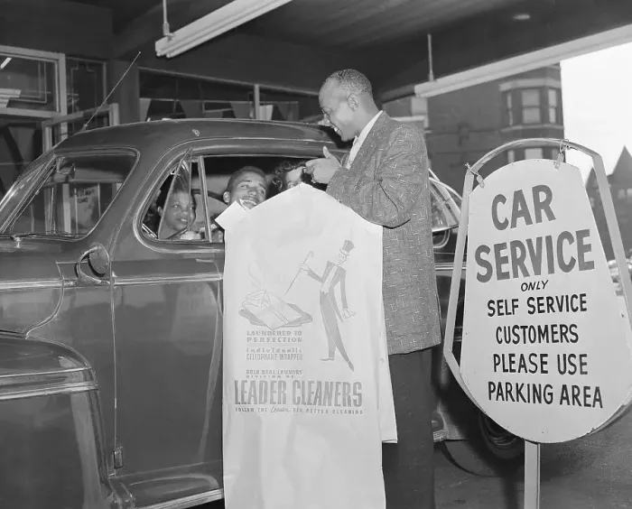Framed Print : Jesse Owens with Customer Framed Print : Jesse Owens with Customer