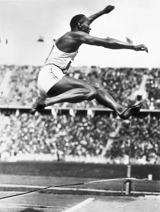 Framed Print : Jesse Owens in Midair Framed Print : Jesse Owens in Midair