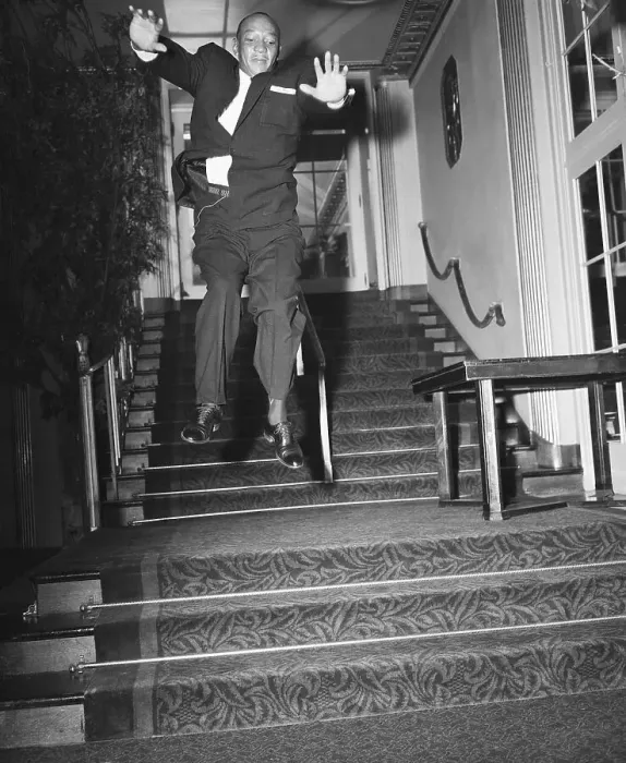 Framed Print : Jesse Owens Walking Down Stairs Framed Print : Jesse Owens Walking Down Stairs