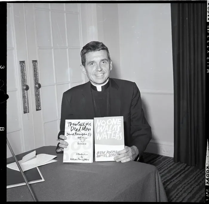 Framed Print : Jesuit Daniel Berrigan Holding Books Framed Print : Jesuit Daniel Berrigan Holding Books