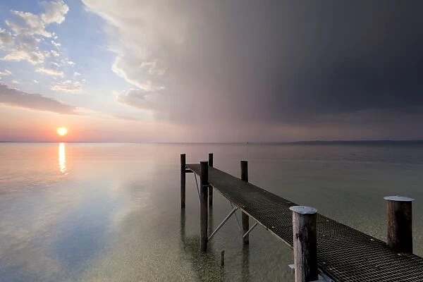Jetty with evening light and stormy atmosphere overlooking Lake Constance near Bregenz, Rohrspitz, Austria, Europe