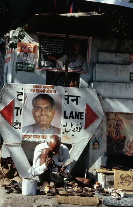 Framed Print : Jewelry Peddler on His Street Vendor Site with Goods