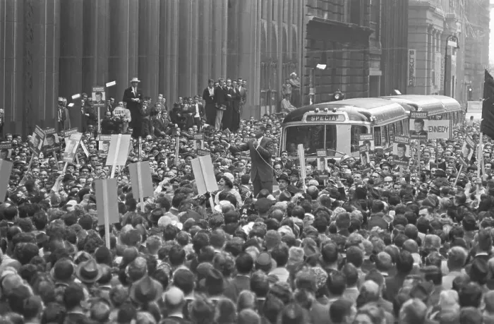 Framed Print : JFK Campaigning from Motorcade in Crowd