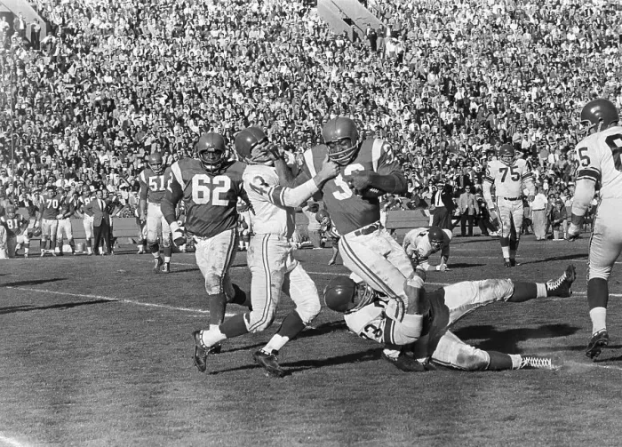 Framed Print : Jim Brown (32) is Tackled in Game Framed Print : Jim Brown (32) is Tackled in Game
