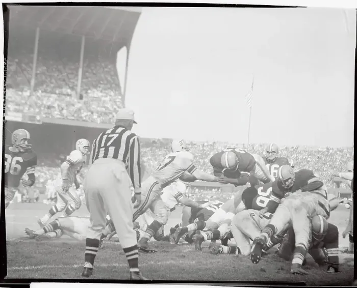 Framed Print : Jim Brown Leaping Over Players Framed Print : Jim Brown Leaping Over Players