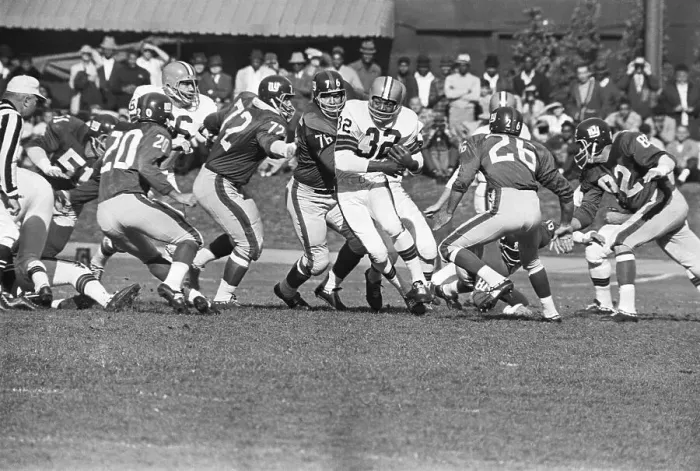 Framed Print : Jim Brown Pursued by Group of Players Framed Print : Jim Brown Pursued by Group of Players