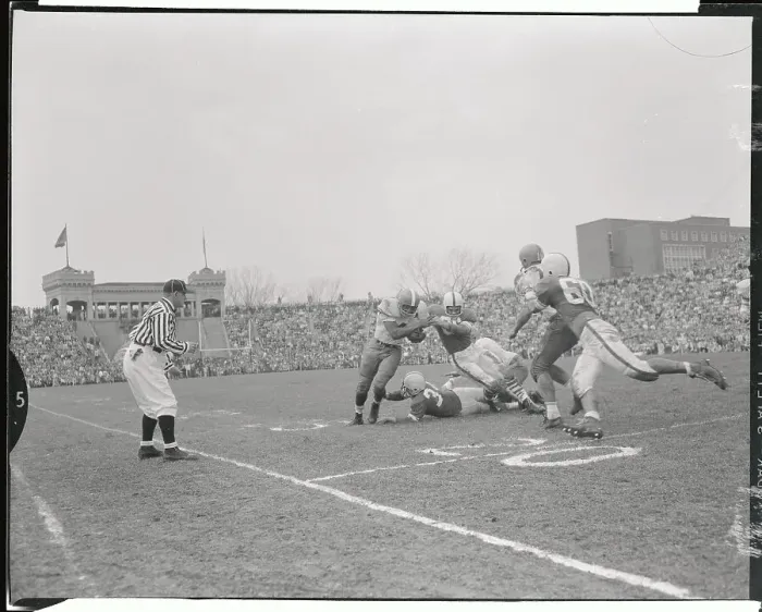 Framed Print : Jim Brown Being Tackled by Opponents Framed Print : Jim Brown Being Tackled by Opponents
