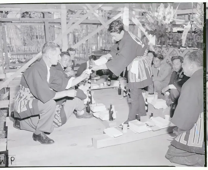 Framed Print : Jim Qiunn Receiving Cup of Saki From Isao Okumura