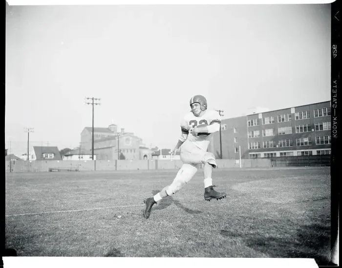 Framed Print : Jim Sears in Football Uniform and Running on Field Framed Print : Jim Sears in Football Uniform and Running on Field