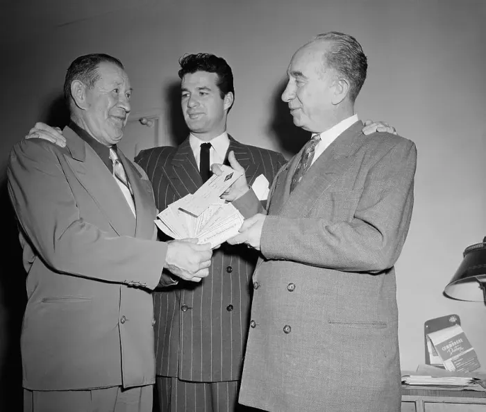 Framed Print : Jim Thorp Showing Checks to His Son and George Trautman Framed Print : Jim Thorp Showing Checks to His Son and George Trautman