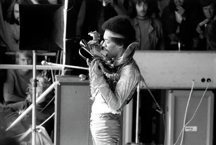 Framed Print : Jimi Hendrix Plays With His Teeth Framed Print : Jimi Hendrix Plays With His Teeth