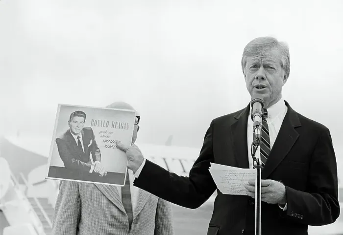 Framed Print : Jimmy Carter Holding a Ronald Reagan Album Framed Print : Jimmy Carter Holding a Ronald Reagan Album