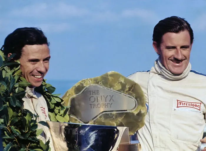 Framed Print : Jimmy Clark Smiling with Teammate Graham Hill