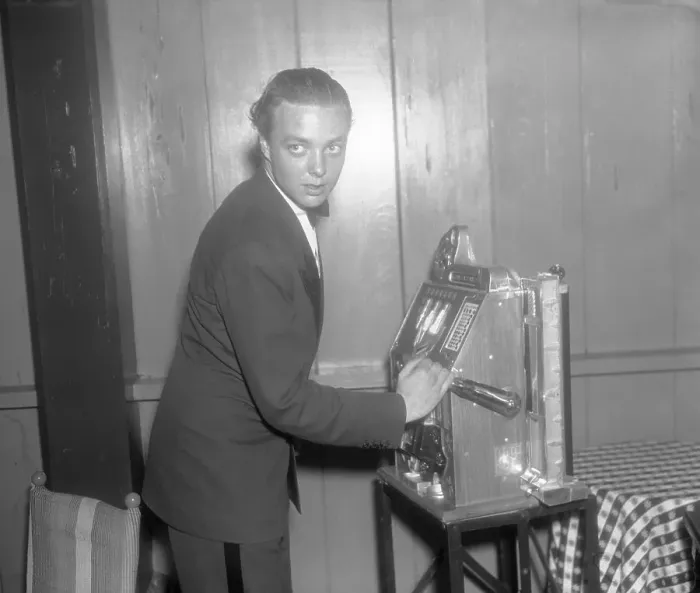Framed Print : Jimmy Donahue Using Slot Machine Framed Print : Jimmy Donahue Using Slot Machine