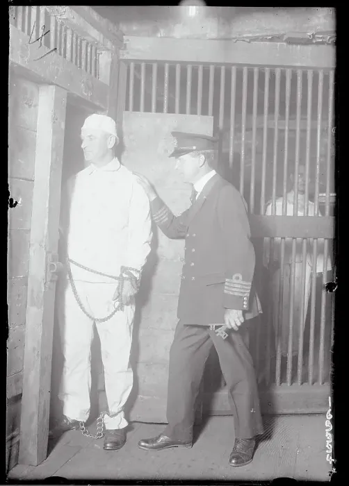 Framed Print : J.J. McNamara Being Put in Cell Framed Print : J.J. McNamara Being Put in Cell