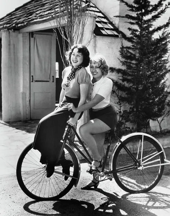 Framed Print : Joan Blondell and Sister Riding Bicycle Framed Print : Joan Blondell and Sister Riding Bicycle