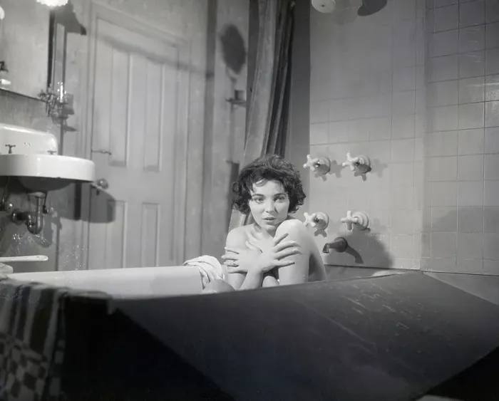 Framed Print : Joan Collins Covering Chest in Bathtub Framed Print : Joan Collins Covering Chest in Bathtub