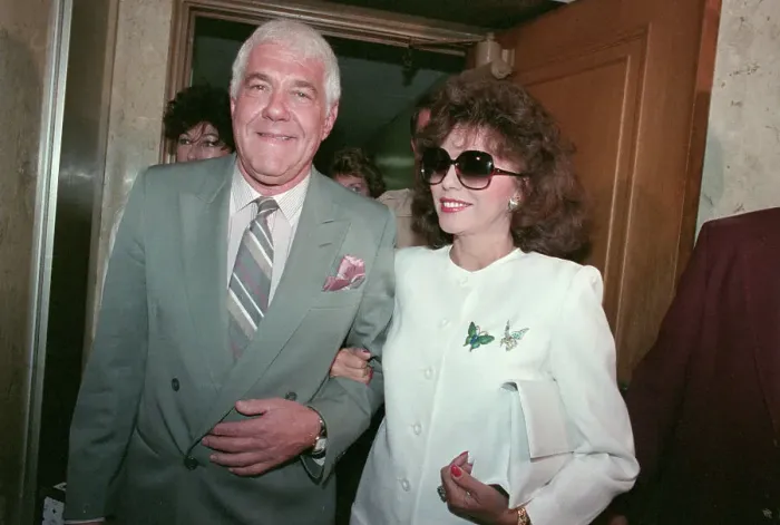 Framed Print : Joan Collins and Lawyer Leave Court Framed Print : Joan Collins and Lawyer Leave Court