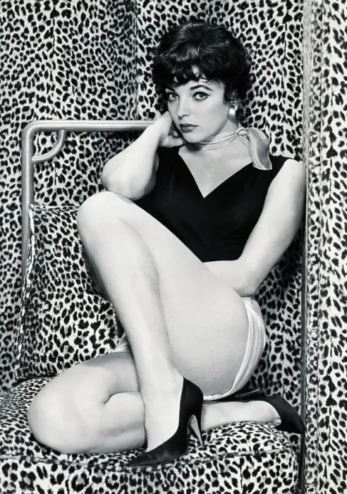 Framed Print : Joan Collins Posing Against Leopard Skin Framed Print : Joan Collins Posing Against Leopard Skin