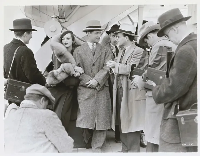 Framed Print : Joan Crawford Holding Onto Robert Montgomery Arm Framed Print : Joan Crawford Holding Onto Robert Montgomery Arm