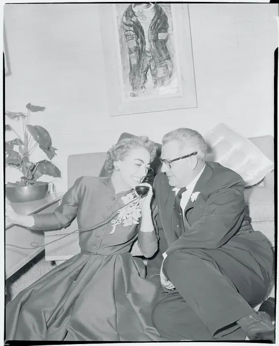 Framed Print : Joan Crawford and Husband Listening on Telephone Framed Print : Joan Crawford and Husband Listening on Telephone