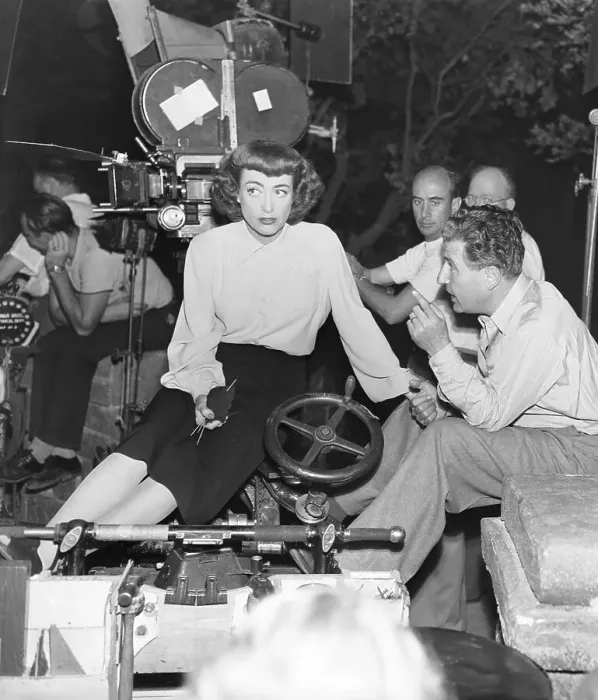 Framed Print : Joan Crawford Listens To Director