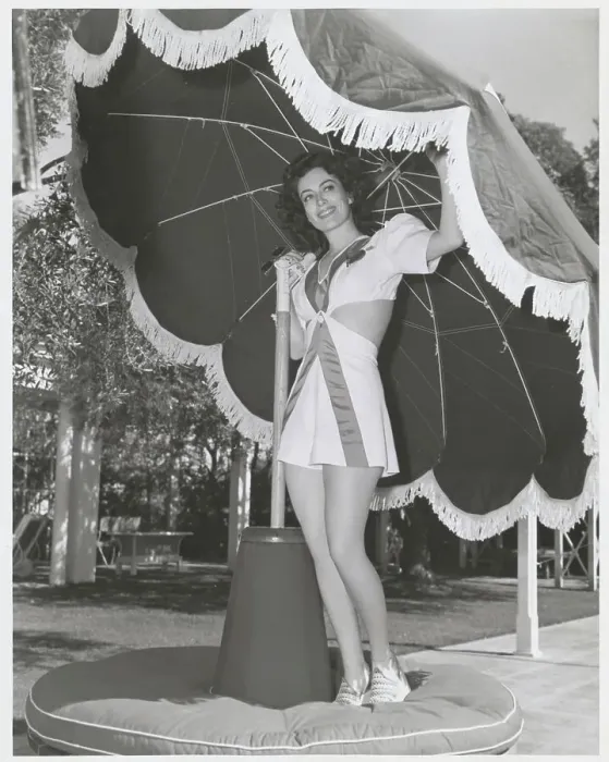 Framed Print : Joan Crawford Posing Under Large Umbrella Framed Print : Joan Crawford Posing Under Large Umbrella