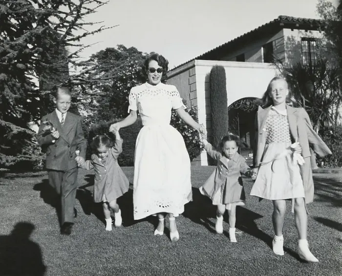 Framed Print : Joan Crawford Walking with Her Children Framed Print : Joan Crawford Walking with Her Children