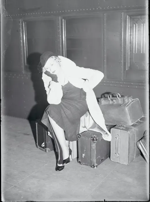 Framed Print : Joan Marsh Resting on Luggage Framed Print : Joan Marsh Resting on Luggage