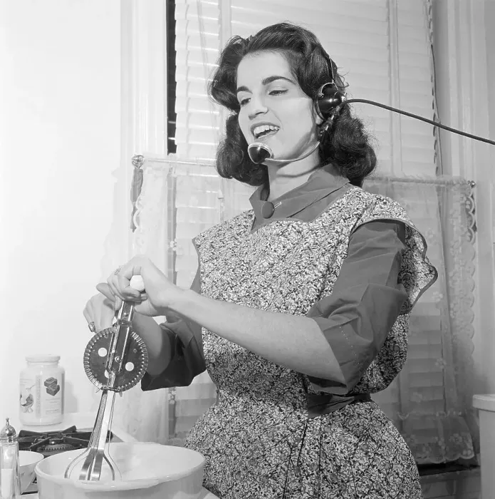 Framed Print : Joann Hulkower Preparing Meal and Talking with Headset Framed Print : Joann Hulkower Preparing Meal and Talking with Headset