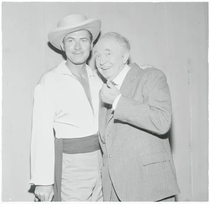 : Jock Mahoney Hugging Walter Brennan : Jock Mahoney Hugging Walter Brennan