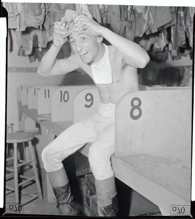 Framed Print : Jockey Eddie Arcaro Holding Ice to Head Framed Print : Jockey Eddie Arcaro Holding Ice to Head
