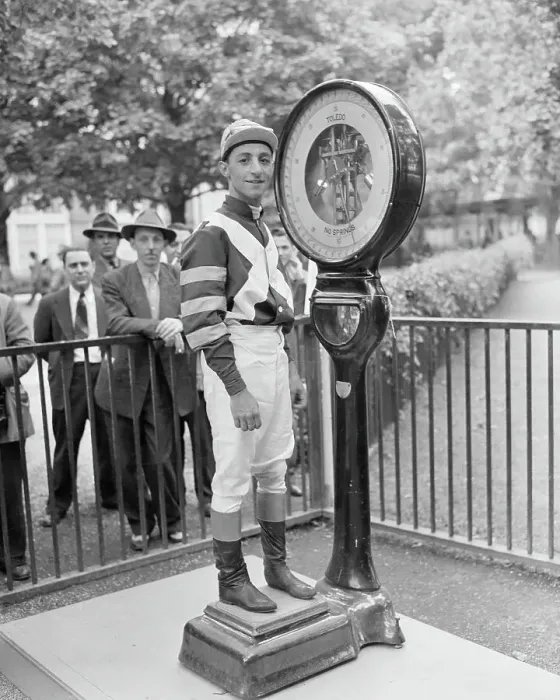 Framed Print : Jockey Eddie Arcaro Weighing In Framed Print : Jockey Eddie Arcaro Weighing In