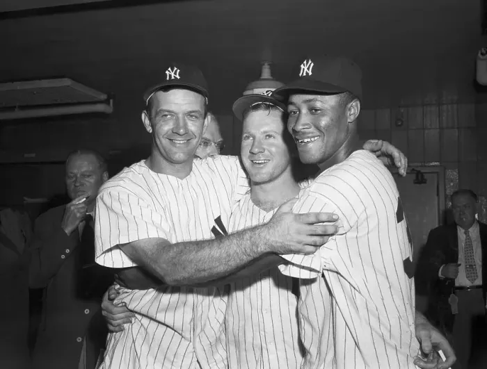 Framed Print : Joe Collins and Elston Howard Embracing Whitey Ford