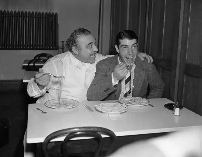 Framed Print : Joe DiMaggio Eating with Actor Henry Armetta Framed Print : Joe DiMaggio Eating with Actor Henry Armetta