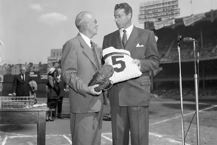Framed Print : Joe DiMaggio Handing in Uniform Framed Print : Joe DiMaggio Handing in Uniform