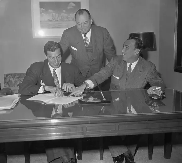 Framed Print : Joe DiMaggio Reviewing Contract with Yankee Executives