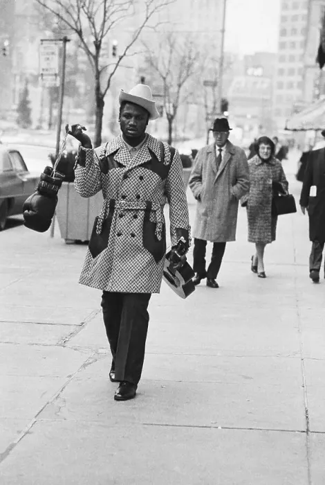 Framed Print : Joe Frazier Carrying Gloves and Guitar Framed Print : Joe Frazier Carrying Gloves and Guitar