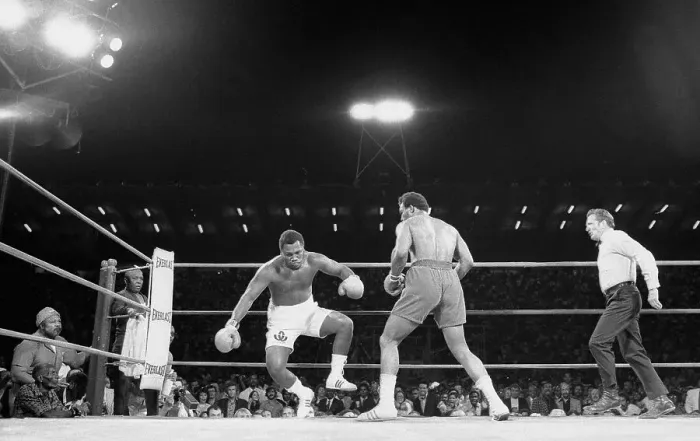 Framed Print : Joe Frazier Landing on The Ropes During Fight Framed Print : Joe Frazier Landing on The Ropes During Fight