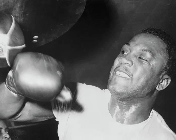 Framed Print : Joe Frazier Working Out with Punching Bag Framed Print : Joe Frazier Working Out with Punching Bag
